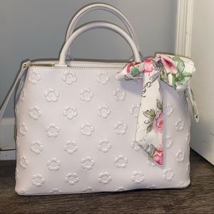 Lightly used large white flower textured purse